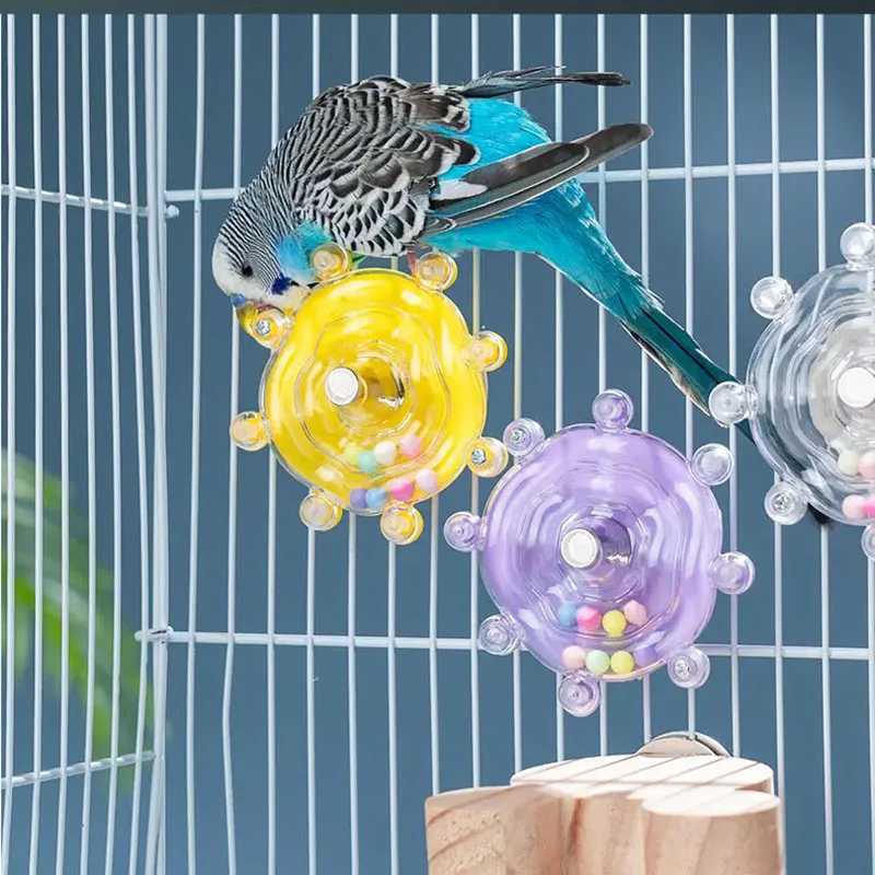 Juguete interactivo para loros — dispensador giratorio de golosinas